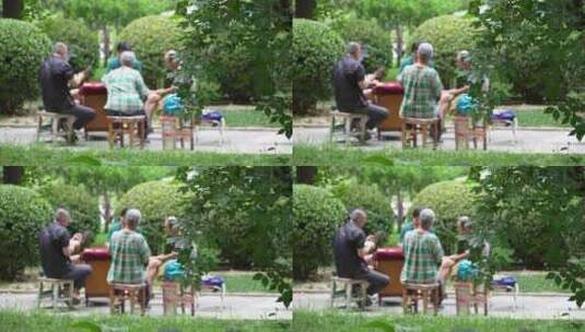 老年人在公园里打扑克牌高清在线视频素材下载