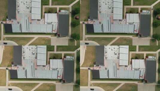 在工业建筑上安装新屋顶的工业屋顶屋顶的无人机视图高清在线视频素材下载