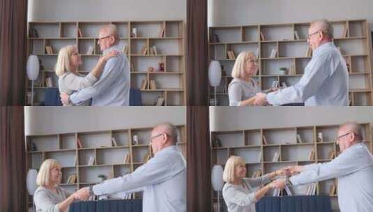 一对欧洲面孔的美丽老年夫妇在家厨房跳舞高清在线视频素材下载