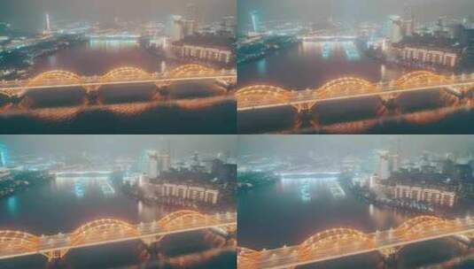 雨中柳州文惠桥与江上喷泉航拍延时高清在线视频素材下载