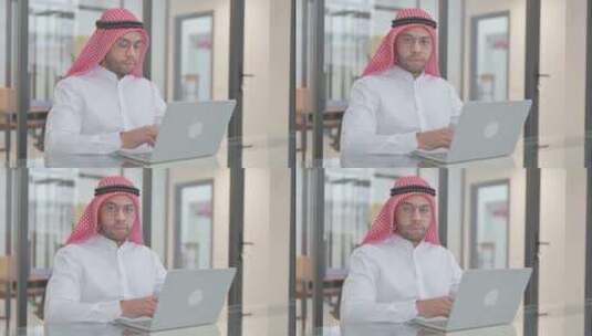 工作中自信的阿拉伯年轻人高清在线视频素材下载