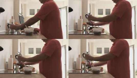 男人早上在家煮咖啡高清在线视频素材下载