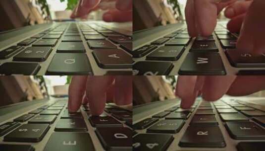 特写手指在笔记本电脑的键盘上打字1_4K高清在线视频素材下载