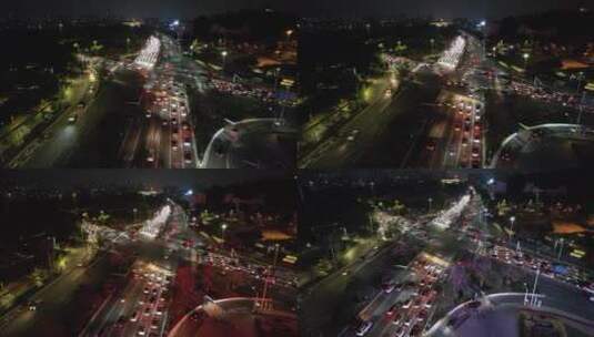 夜晚车来车往的城市十字路航拍高清在线视频素材下载