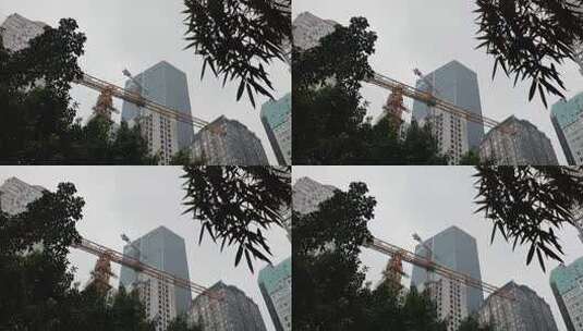 城市里正在施工的工地塔吊高清在线视频素材下载