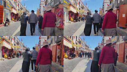 西藏拉萨大昭寺八廓接转经的游客信众高清在线视频素材下载