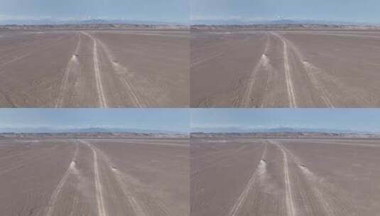 4k航拍沙漠戈壁中行驶的车高清在线视频素材下载