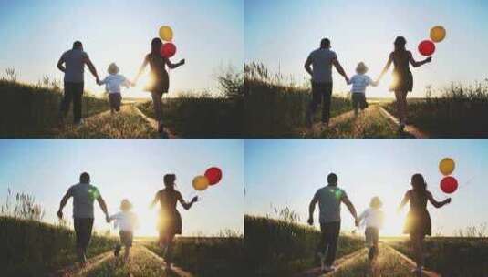 后景幸福一家人牵着手一起奔跑在麦田上高清在线视频素材下载