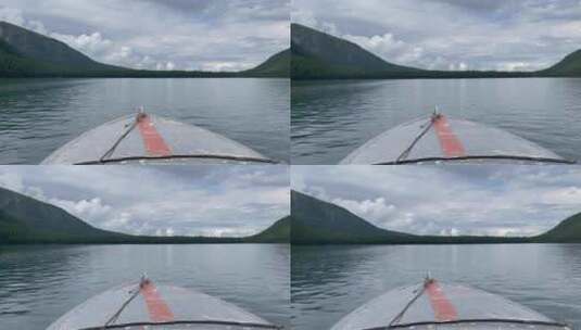 蓝天白云下在湖上开动的摩托艇高清在线视频素材下载