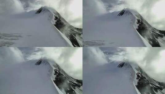 航拍川西沙鲁里山脉云雾中的雪山高清在线视频素材下载