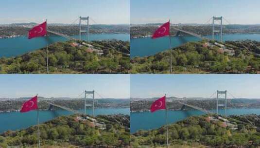 法提赫苏丹穆罕默德大桥和土耳其国旗的鸟瞰图高清在线视频素材下载