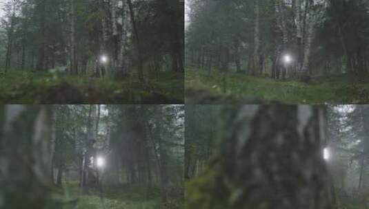 男人在原始森林的雨中徒步着高清在线视频素材下载