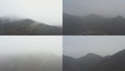 雾气缭绕下的海边山城小镇高清在线视频素材下载