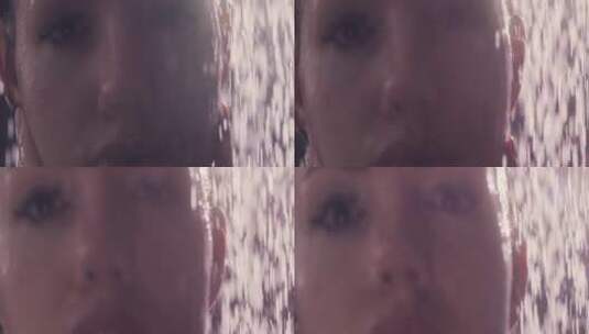 女人淋浴时的肖像特写高清在线视频素材下载