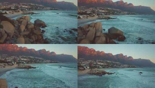 无人机拍摄日落时的海岸景观高清在线视频素材下载