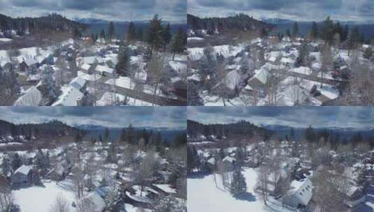 一个白雪皑皑的小村庄航拍高清在线视频素材下载