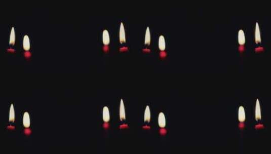 黑暗中的 4 支蜡烛高清在线视频素材下载