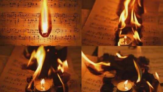 用蜡烛燃烧的乐谱高清在线视频素材下载