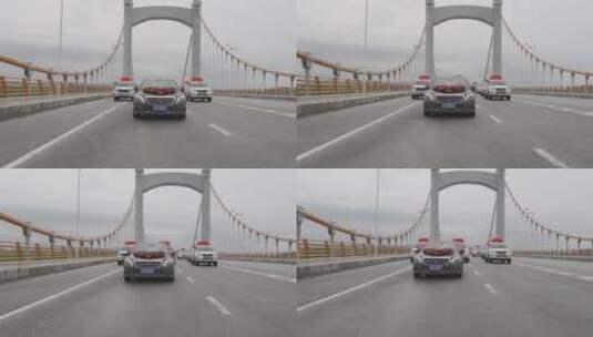 婚车车队行驶在马路和桥梁上高清在线视频素材下载
