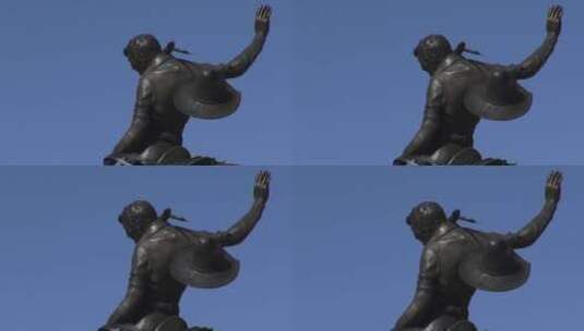 举手的牛仔雕像高清在线视频素材下载