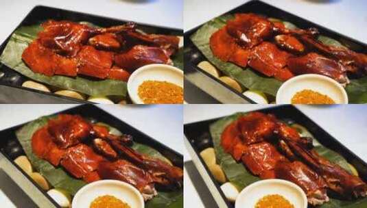 中国传统美食，细腻多汁的脆皮烤鸭摆盘高清在线视频素材下载