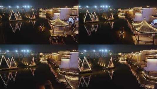 小船在河道中前行江南水乡古镇徽派建筑飞檐高清在线视频素材下载