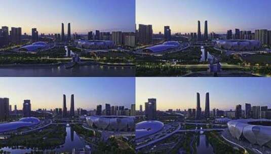 2024杭州奥体博览城日出航拍高清在线视频素材下载