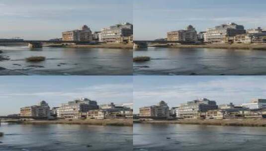 城市景观天际线垂直延时视频在加茂河的早晨高清在线视频素材下载