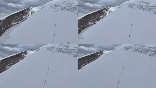 航拍攀登慕士塔格峰雪山冰川的登山队高清在线视频素材下载