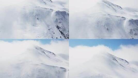云雾缭绕的夹金山美丽航拍风景川西大气雪山高清在线视频素材下载