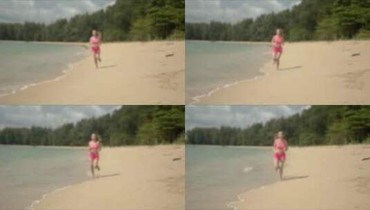 穿着粉色运动服在海滩上跑步的女人高清在线视频素材下载