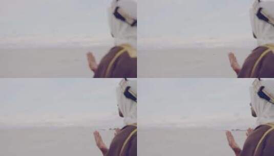 阿拉伯人在沙漠祈祷高清在线视频素材下载