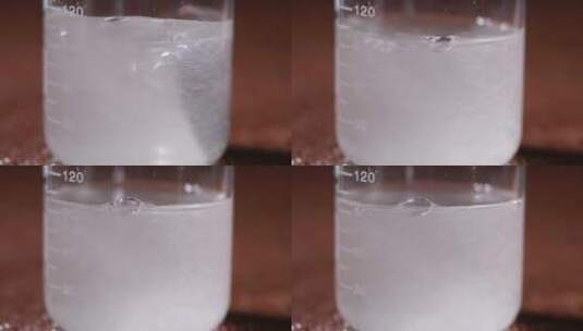 烧杯融化白色化学粉末石蜡高清在线视频素材下载