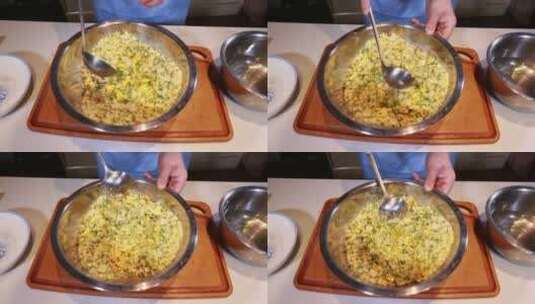 棒子面玉米面混合韭菜做糊饼高清在线视频素材下载