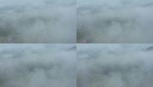 航拍烟雨缥缈的山村高清在线视频素材下载