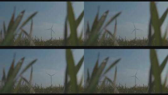 在蓝天绿草的背景下旋转风车。风力高清在线视频素材下载