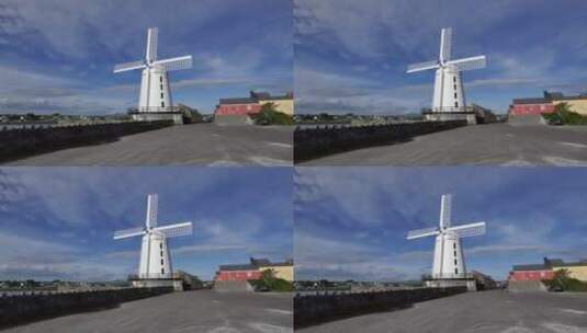 蓝天下的风车景观高清在线视频素材下载