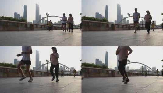 广州珠江新城早晨跑步锻炼的人群升格慢镜头高清在线视频素材下载