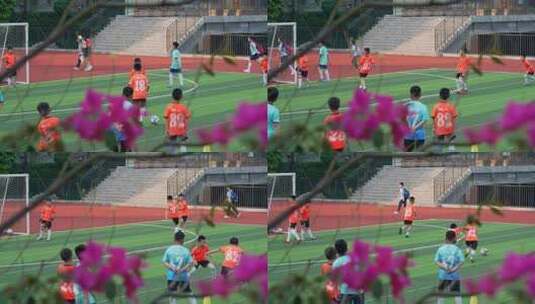 校园操场小学生踢足球高清在线视频素材下载