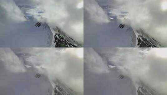 航拍川西沙鲁里山脉云雾中的雪山高清在线视频素材下载