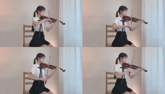 美女拉小提琴美女在家拉小提琴演奏高清在线视频素材下载