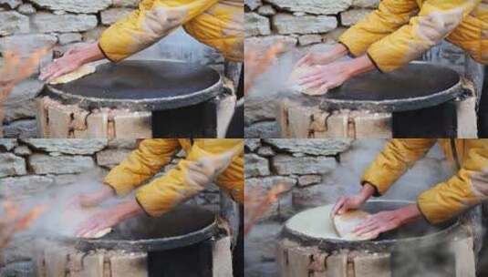 冬日传统烧柴烙煎饼高清在线视频素材下载