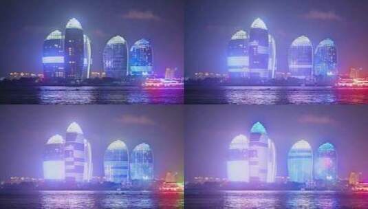 海南三亚凤凰岛城市夜景绚烂灯光秀高清在线视频素材下载