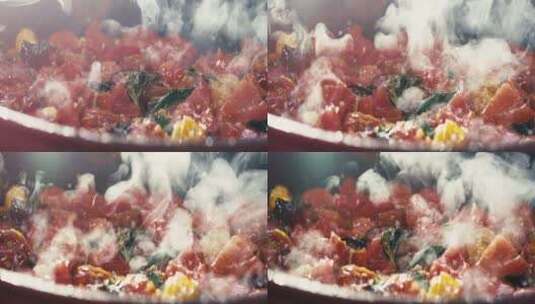 在锅里炖的油炸樱桃番茄高清在线视频素材下载