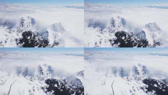 航拍云雾缭绕的川西雪山夹金山垭口风景高清在线视频素材下载
