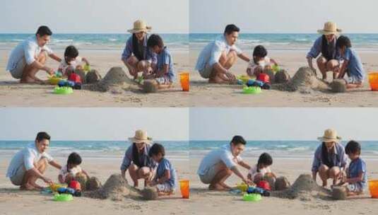 一家人在沙滩上玩沙子高清在线视频素材下载