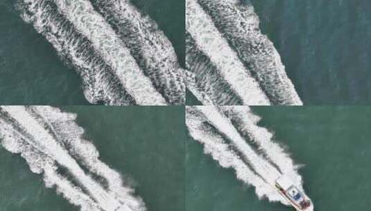 航拍跟随威海市高新区双岛湾海面上高速快艇高清在线视频素材下载