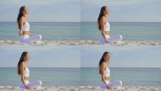 美丽的女人在海上做瑜伽，和谐与自由，海洋高清在线视频素材下载