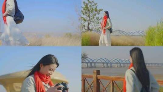 女孩黄河岸边游览拍照找寻灵感高清在线视频素材下载