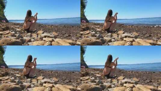 在海滩上放松的女人高清在线视频素材下载